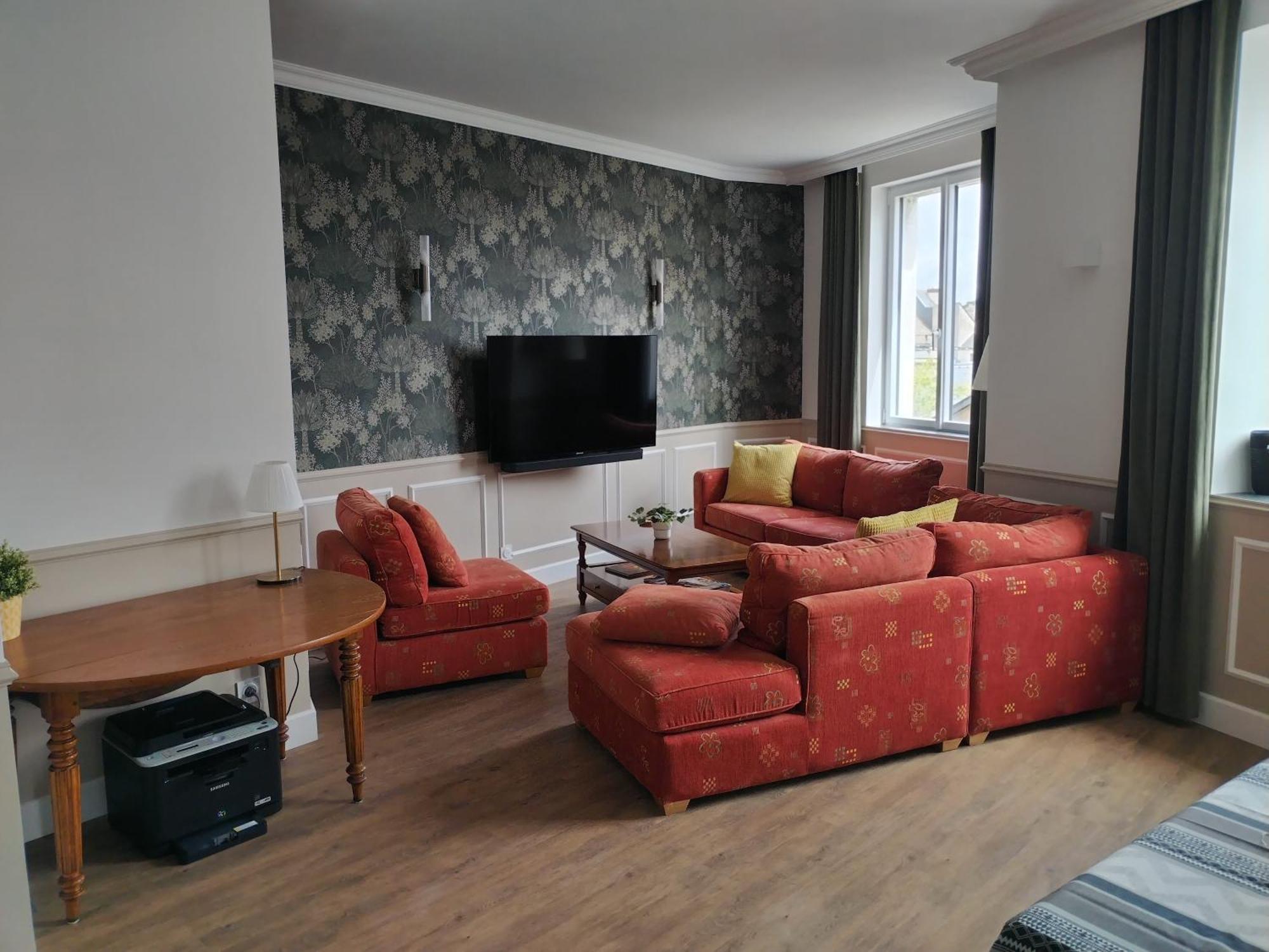 Le Familia Apartment Guer Luaran gambar