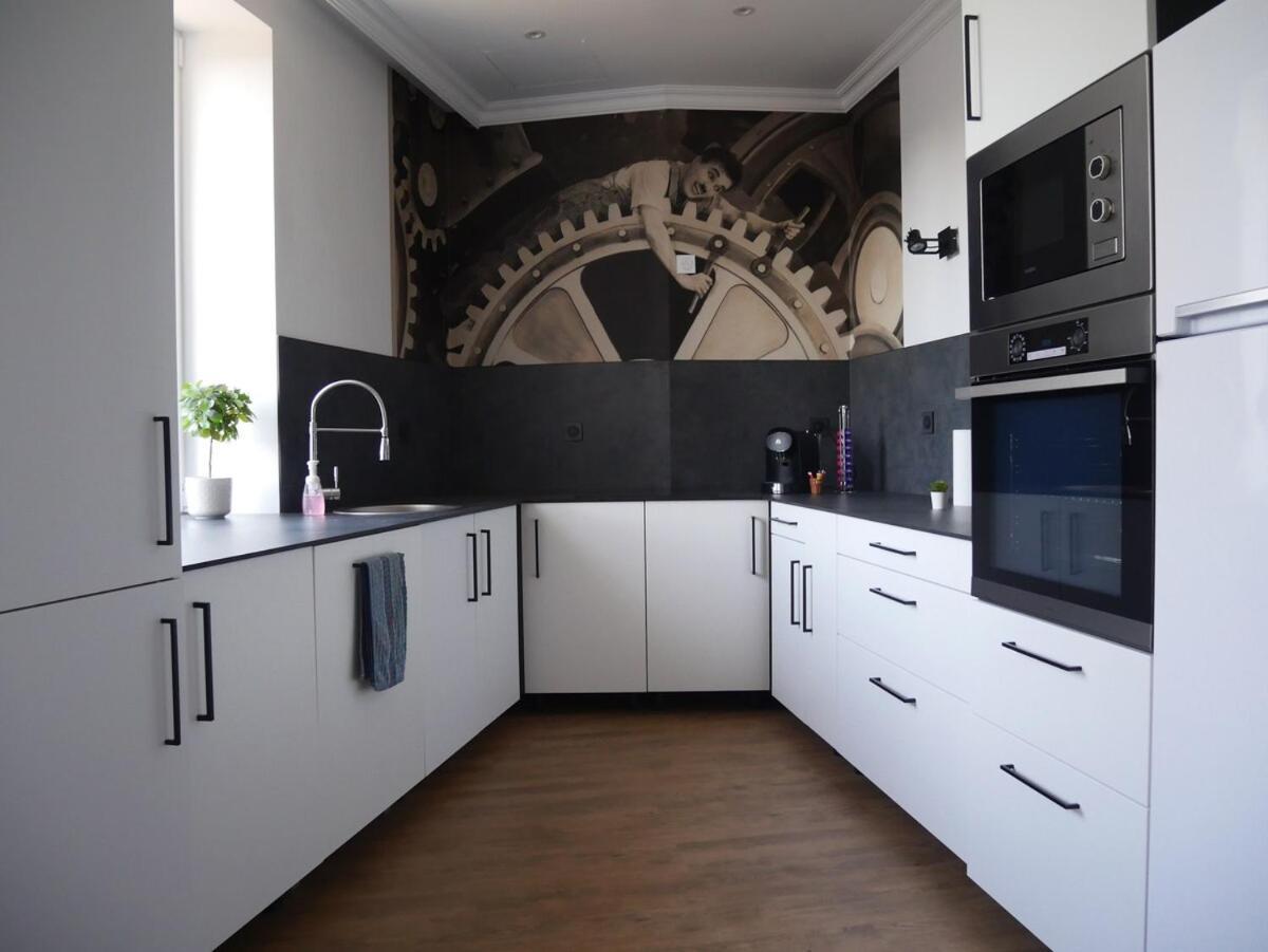 Le Familia Apartment Guer Luaran gambar